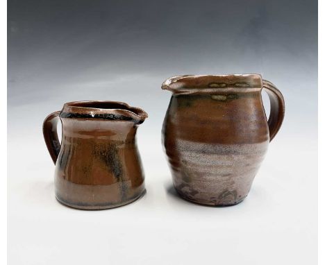 A Leach studio pottery jug, impressed St. Ives studio mark, height 12cm, and one other studio pottery jug 9cm (2).