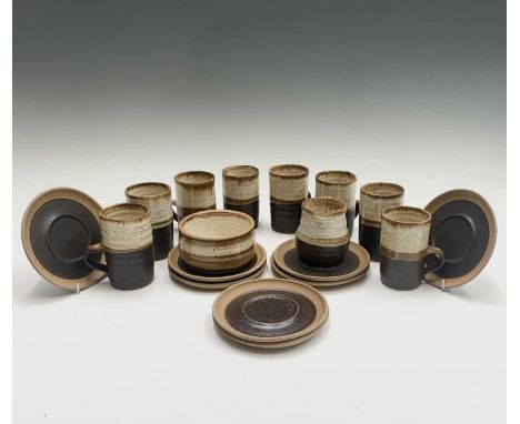 A Newlyn Harbour pottery coffee set, 1960s, comprising of eight cups and saucers, a sugar bowl and cream jug, the latter heig