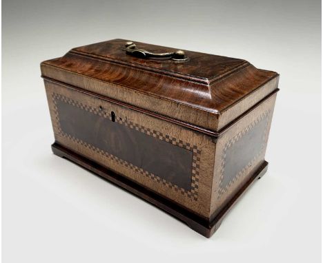 A George III figured mahogany, crossbanded and chequer strung tea caddy, with brass handle and triple divided interior, width