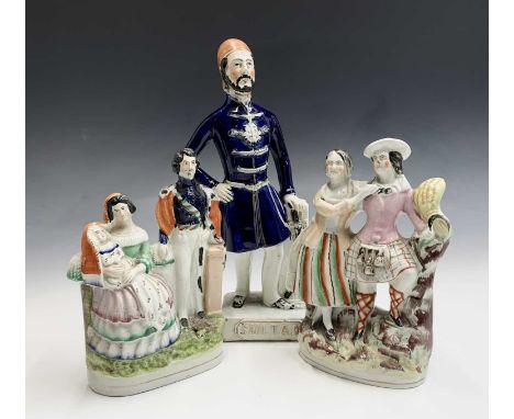 A 19th century Staffordshire portrait figure of Abdul Mejid, Sultan of Turkey, height 31cm, together with two Staffordshire f