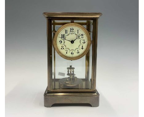 A German four glass torsion mantel clock, circa 1900, the enamel dial decorated floral garlands, diameter 10.5cm, the undersi