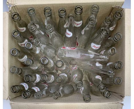 A collection of 38 vintage Pepsi Cola bottles, each 21cm tall.