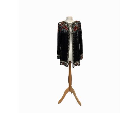A heavily sequinned and beaded jacket, black with red, white and blue floral motifs, reputedly made in the Christian Dior ate