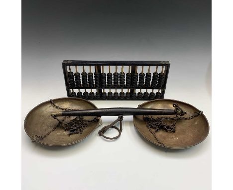 A 19th century set of hardwood and brass beam scales, with numerous stamps and numbers to beam and pans, length 50cm, togethe