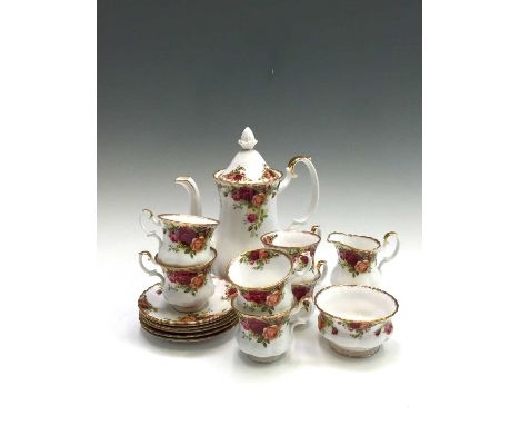 A Royal Albert 'Old Country Roses' coffee service comprising coffee pot, sugar bowl, cream jug, six coffee cups and six sauce