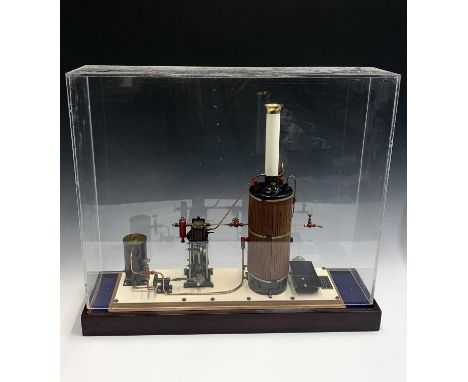 A Maxwell Hemmens of York precision scale model of a vertical marine stem plant, with mahogany clad boiler and twin cylinders