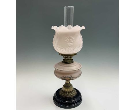 A late Victorian pink opaline glass oil lamp, painted with fruit, with moulded glass shade and chimney, height 54cm, together