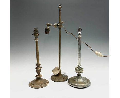 A vintage brass adjustable table lamp, height 49.5cm, together with two other table lamps (3).