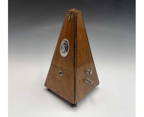 A German made 'System Maelzel' metronome. Height 22cm. 