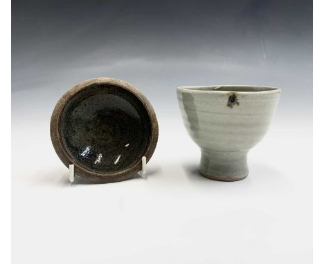 A Leach studio pottery celadon glazed tea bowl, height 7.5, together with a small bowl, diameter 8.5cm, both having impressed
