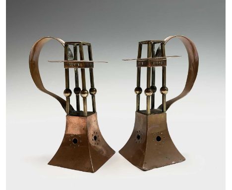 A pair of stylish Jugendstil copper candlesticks by Carl Deffner of Esslingen in the Art Nouveau style with openwork and pier