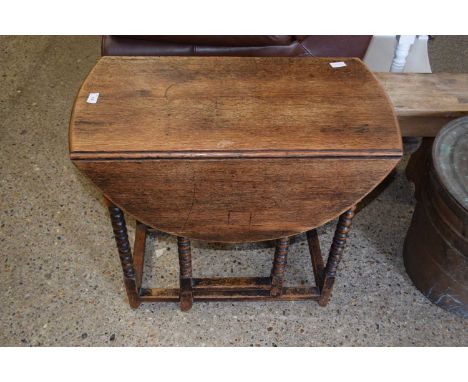 Small oak drop leaf table on bobbin turned legs
