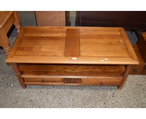 Modern light wood coffee table with base drawers