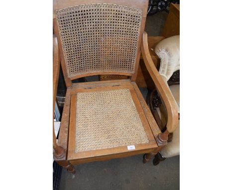 Cane seated commode chair