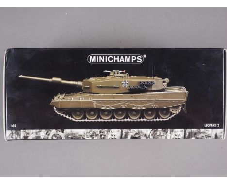 A Minichamps die-cast 1:35 scale model of a Leopard 2 tank, mint and boxed 