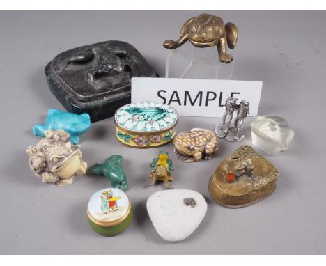 A collection of approximately 200 ceramic, wood, composition, stone and metal frogs and toads 