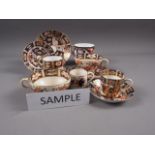 A quantity of Imari pattern china, including a pair of Davenport coffee cups, Royal Crown derby