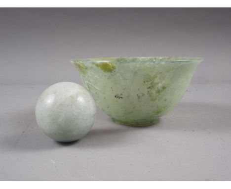 A turned green jade bowl, 4" dia, and a similar green hardstone ball, 1 1/4" dia 