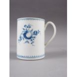 An 18th century Worcester mug with hand-painted floral decoration