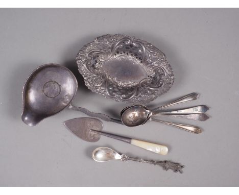 A white metal punch ladle (no handle), four assorted spoons, a white metal bonbon dish and a heart-shaped fruit knife with mo