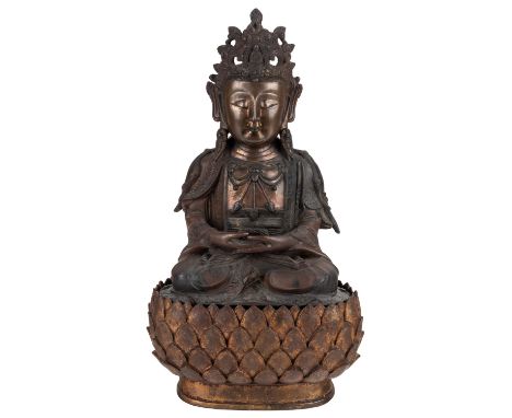 A GILT SINO-TIBETAN BRONZE FIGURE OF A GUANYIN WITH WOODEN BASE, 19TH CENTURY bronze with red-brown patina, the wood base mod