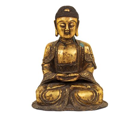 A GILT BRONZE FIGURE OF BUDDHA SHAKYAMUNI bronze with brown patina, gilt overall, save for hair; overall height: 39 cm (15 3/