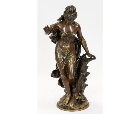 A BRONZE FIGURE OF A WOMAN, 19TH CENTURY modelled as a maiden in thought, with a sparrow at her feet, bronze with dark brown 