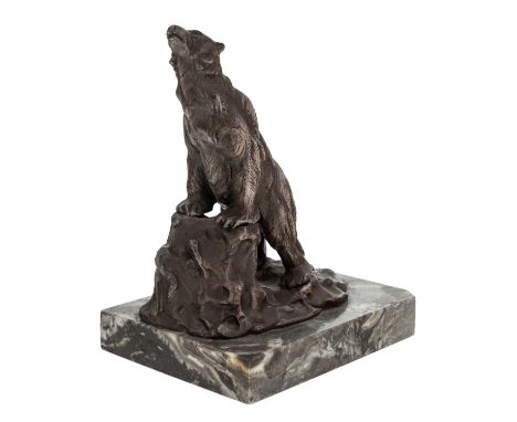 A BOOKEND BY ERNEST LOUIS ADNIN (FRENCH 1881-1957) Polar Bear on Hind legs,  bronze with light brown patina atop granite base