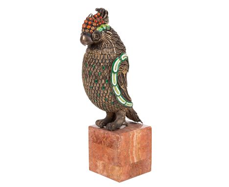 A EUROPEAN GILT SILVER AND GUILLOCHE ENAMEL CHINOISERIE PARROT, 1930 the parrot with green and red detailing, standing on a p