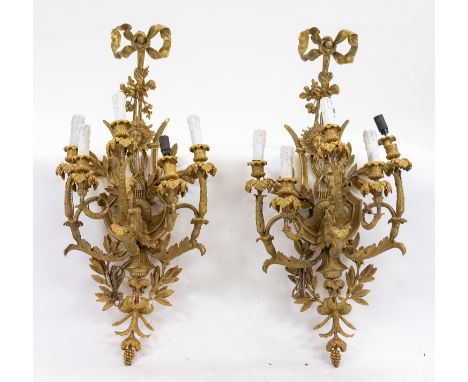 A PAIR OF ORMOLU BRONZE CANDELABRA WALL MOUNTS each five-light candelabra modelled as a bouquet of flowers with scrolling aca