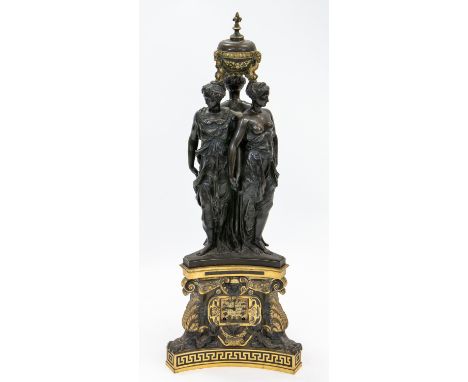 AN IMPRESSIVE ORMOLU BRONZE MANTEL CLOCK, 19TH CENTURY the clock and inscriptions in stylised frames, each face flanked by sc