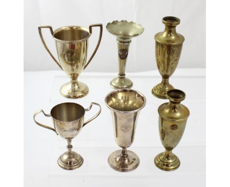 A pair of brass maritime interest baluster vases bearing a sigil of an anchor with ND either side, assorted vases and trophy 