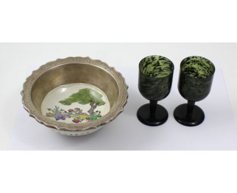 A 20th century Oriental white metal and ceramic footed bowl, hand-painted with scenes of playing children, with character mar