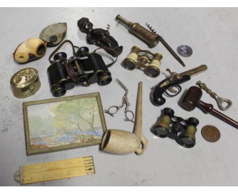 A cased pair of Goerz binoculars, a clay pipe, a novelty bottle opener in the form of an African, a 19th century brass and co