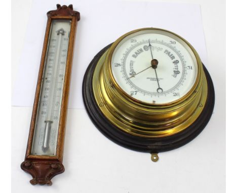 A brass ships clock by John Barker &amp; Co Ltd Kensington, diameter 19cm, and an early 20th century oak cased wall hanging t
