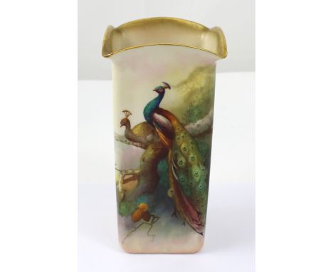 A Royal Worcester hand painted square peacock vase with averted rim, signed A Shuck to the bottom of one panel, date marked f