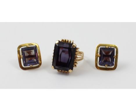 An emerald cut alexandrite solitaire dress ring with yellow metal wire work mount, size R, and a pair of cushion cut alexandr