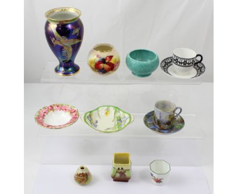 A group of collectible ceramics to include a Royal Worcester autumnal pattern wrythen vase decorated with blackberries and le