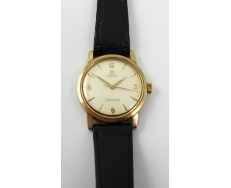 Omega Seamaster; a vintage 9ct gold gentlemen's wristwatch, marked 375 to lugs, approx diameter 3.2cm, presented on later gen