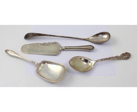 A silver cake slice, Alvin, marked Sterling Silver, a serving spoon with shell and scroll finial, with central Grecian figure