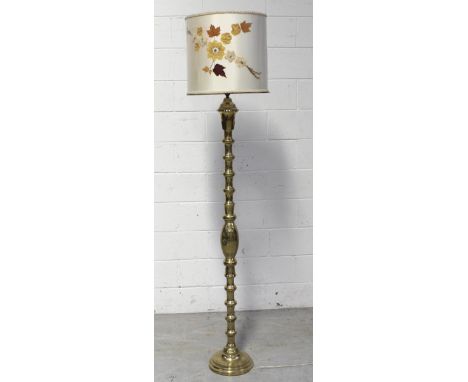 A mid 20th century Eastern style brass standard lamp, height approx 150cm.