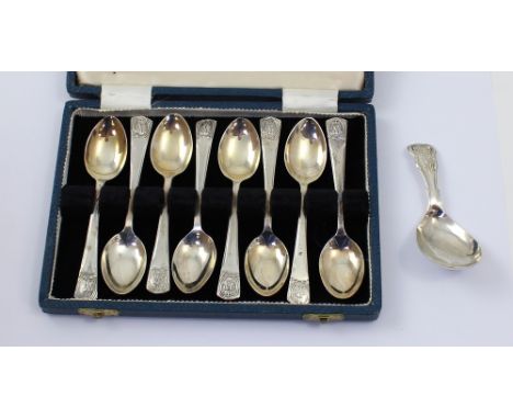 A George VI hallmarked silver cased set of eight teaspoons, Birmingham 1935-6, a hallmarked silver caddy spoon, and a plated 