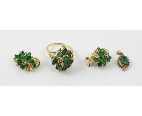 A 14ct gold dress ring floral-set with green stones and small diamonds, size R, a matching floral pendant and a pair of match