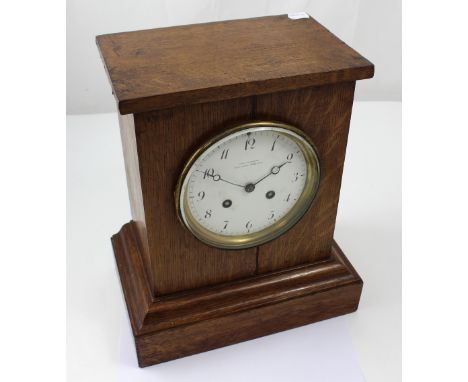 A Victorian oak-cased Charles Frodsham mantel clock, striking on a bell, the Arabic dial marked 'Chas Frodsham Clockmaker to 