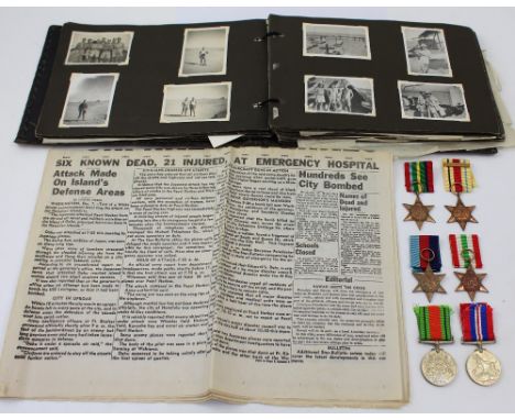 A group of WWII medals including Africa Star, Italy Star, 1939-45 Star, War Medal and Defence Medal, a selection of Africa Ca