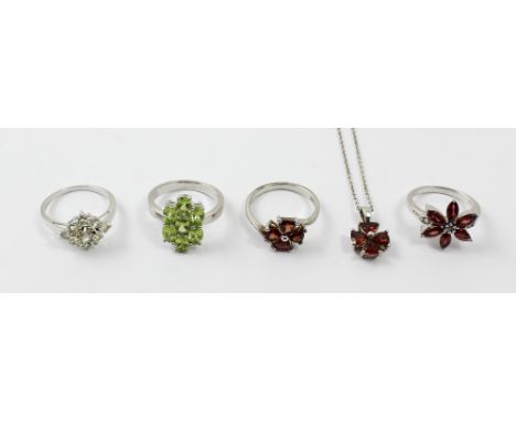 Four sterling silver gem-set rings including a 'Hellodor' example, size R-S, a 'Changbai Peridot' example size R-S, a 'Cuamba