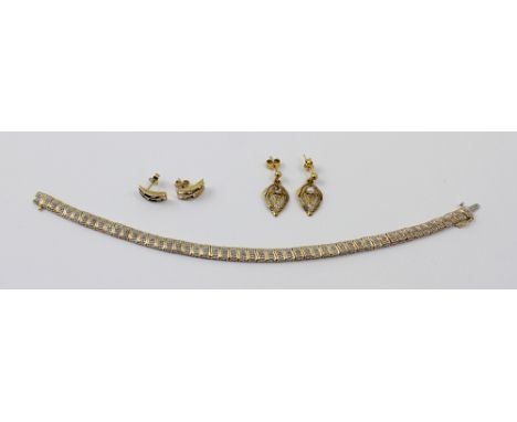 A 9ct gold and chip diamond plate link bracelet and two pairs of 9ct gold earrings, approx combined 12g (3).