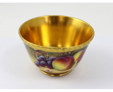 A mid 20th century Royal Worcester fruit painted bowl, with peaches, grapes, cherries, blueberries etc, with gilt edged rim a