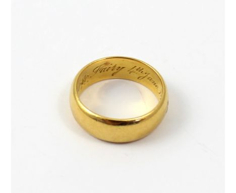 A 22ct gold band inscribed 'Bert to Fairy 4th June 1914', size K 1/2, approx 7g.