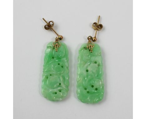 A pair of c1930s yellow gold and celadon jade drop earrings, carved with fruit and flowers, drop 4cm, approx 10.5g. CONDITION